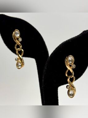 Vintage Swan signed Swarovski Gold Tone Twisted Drop Earrings with Clear Stone